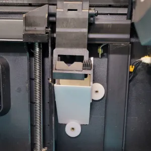 External waste chute for K1C
