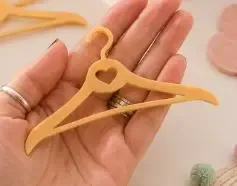 Clothes hangers for dolls