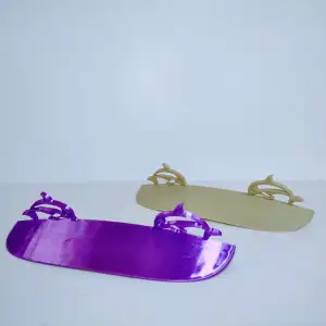 Sunshades for eyeglasses with dolphin motif