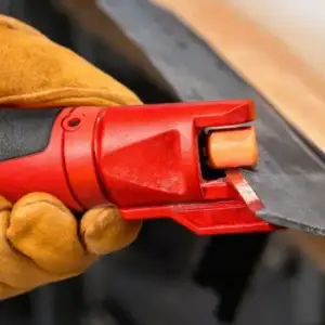 lawnmower blade shaper attachement for rotary tool