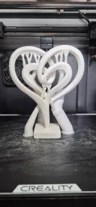Sculpture moderne coeur enlacé elegant