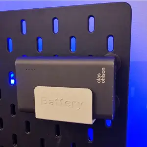 Powerbank holder (an 'Ikea Skadis Charger wall' module)