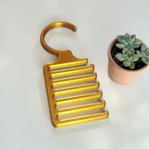 Vertical Belt Comb Hanger