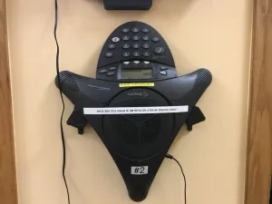 Polycom wall mount pegs