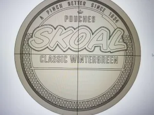 Skoal can lid wall hanger