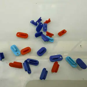 Dust plugs for mobile phones