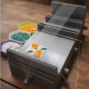 Bead weawing machine