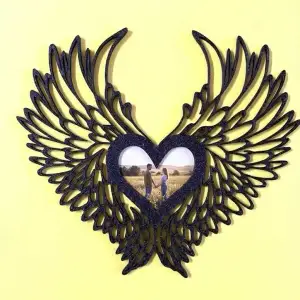 Photo frame with wings and heart