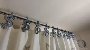 Shower curtain holder