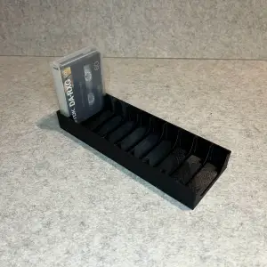 Stand holder for DAT cassette tapes
