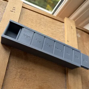 Pill Box with Sliding Lid
