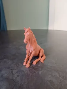 Realistic Sitting Horse Figurine
