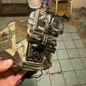 Action camera mount for FAST/FMA/MICH helmets