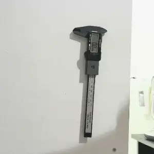 CALIPER HOLDER