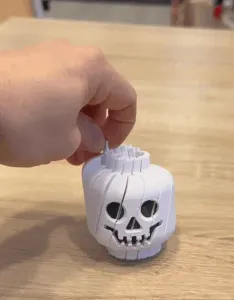 Twisty brick skeleton head fidget