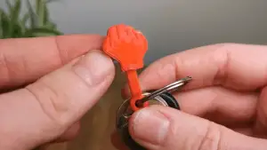 Mini Flip Middle Finger Keychain