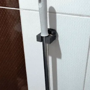 WALL-MOUNTED MOP/BROOM HOLDER
