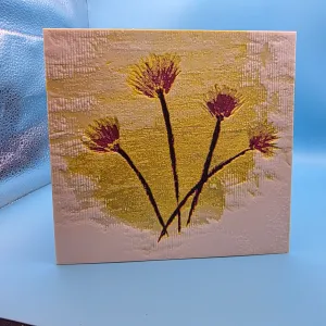 4 purple flowers on yellow