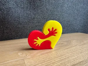 Heart hug figurine
