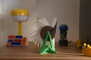 Single arm photo flipper