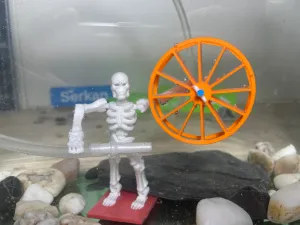 Skeleton Aquarium Accessory with Spinning Wheel!
