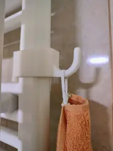 Side towel rail for bathroom radiator