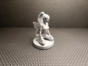 Mystic Pixie – Graceful Kneeling Fairy Statue