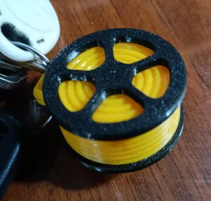 Keychain coil of filament