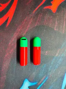 Capsule-shaped container in two sizes.