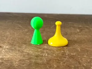 Playing pieces for board games