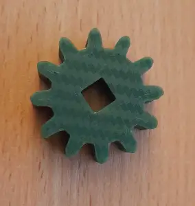 Gear for a toothed transmission.
