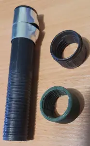 Round nut for clamping the reel seat
