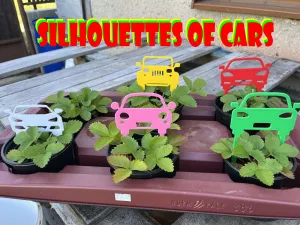 Silhouettes of cars as a pin in the cake