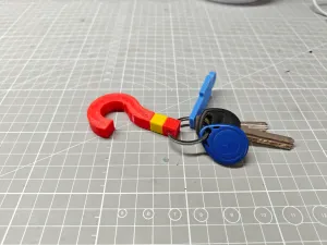 Question mark-shaped key hook