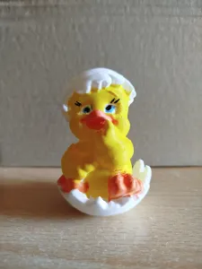 Easter cute chicken in a shell