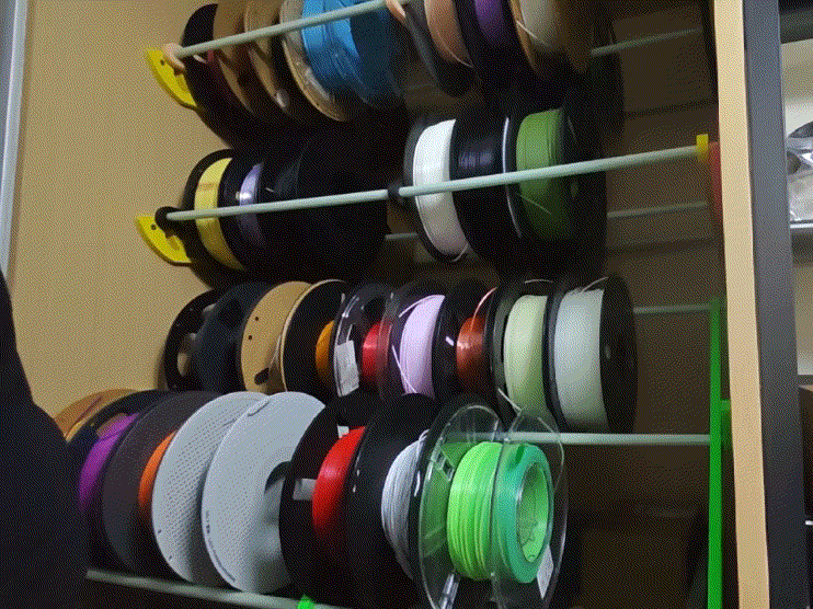 Double row consumables storage rack - push-pull rotation