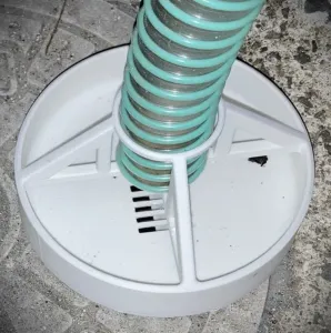 Connect the hose to the drain cover