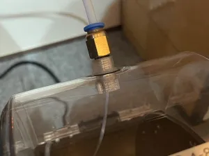 Filament dryer outlet attachment