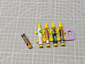 Magazine-Style AAA Battery Organizer - Infinitely Stackable