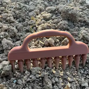 Rake in hand, stake