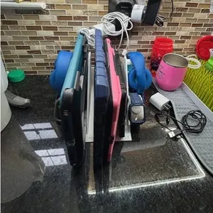 four IPAD/ two apple watches/ two headphones stand