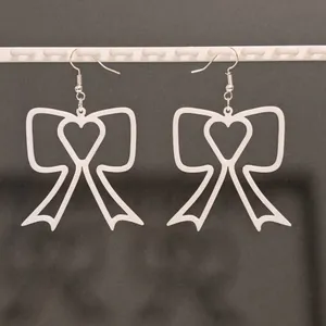 Bow earrings with heart