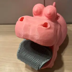 A funny hippopotamus-shaped soap or sponge holder