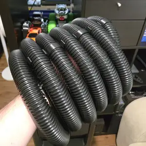 Vacuum hose storage clip
