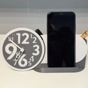 Clock for the desk, with cell phone holder and pencil box