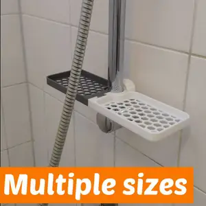 Dual shower shelf