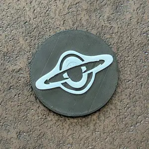 black hole coin with stand