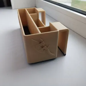 Holder for remote control and phone