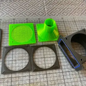 Fan adapter with filter chamber