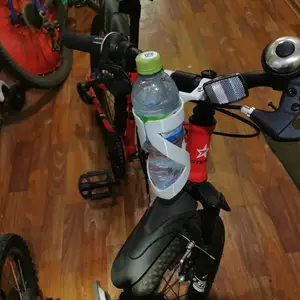 Bottle holder for bicycle handlebar